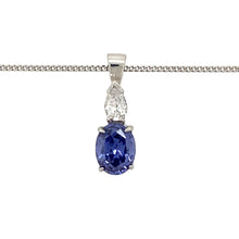 Load image into Gallery viewer, Add a touch of elegance and sparkle to your jewellery collection with this pre-owned 9ct white gold tanzanite &amp; cubic zirconia set pendant necklace, featuring:

Design: A stunning pendant necklace, showcasing a vibrant tanzanite-coloured stone accented with sparkling cubic zirconia for added brilliance.
Material: 9-carat white gold, offering a sleek and modern appeal.
Gemstones: Features a 9mm by 7mm tanzanite-coloured stone, beautifully complemented by cubic zirconia accents.
Size &amp; Weight: The pendant mea
