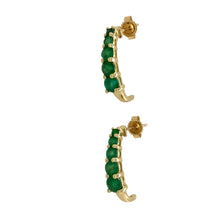 Load image into Gallery viewer, Add a touch of elegance and colour to your jewellery collection with these pre-owned 9ct gold &amp; green emerald-coloured stone set half hoop stud earrings, featuring:

Design: Classic half hoop stud earrings, with a graceful row of gemstones that graduate in size for a refined look.
Material: 9-carat gold, offering a warm and timeless appeal.
Gemstones: Set with green emerald-coloured stones, arranged in a graduating pattern, with the largest stone measuring 4mm in diameter.
Weight: A well-balanced 2.30 grams

