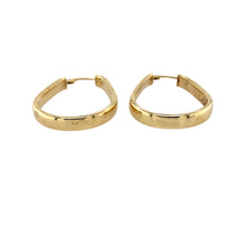 Load image into Gallery viewer, Add a touch of timeless elegance to your jewellery collection with these pre-owned 9ct yellow gold plain oval creole earrings, featuring:

Design: Classic oval creole earrings, offering a sleek and sophisticated look.
Material: 9-carat yellow gold, providing a warm and polished finish.
Weight: A well-balanced 2.70 grams, ensuring durability while remaining comfortable for everyday wear.
A versatile and stylish accessory, perfect for adding effortless elegance to any outfit.
