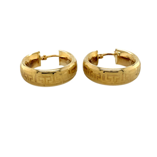 Add a bold and sophisticated touch to your jewellery collection with these pre-owned 9ct yellow gold Greek key hoop creole earrings, featuring:

Design: Classic creole hoop earrings adorned with a striking Greek key pattern, symbolising infinity and unity.
Material: 9-carat yellow gold, offering a warm and timeless appeal.
Weight: A substantial 5.10 grams, ensuring a durable and high-quality feel.
A stylish and meaningful accessory, perfect for those who appreciate elegant jewellery