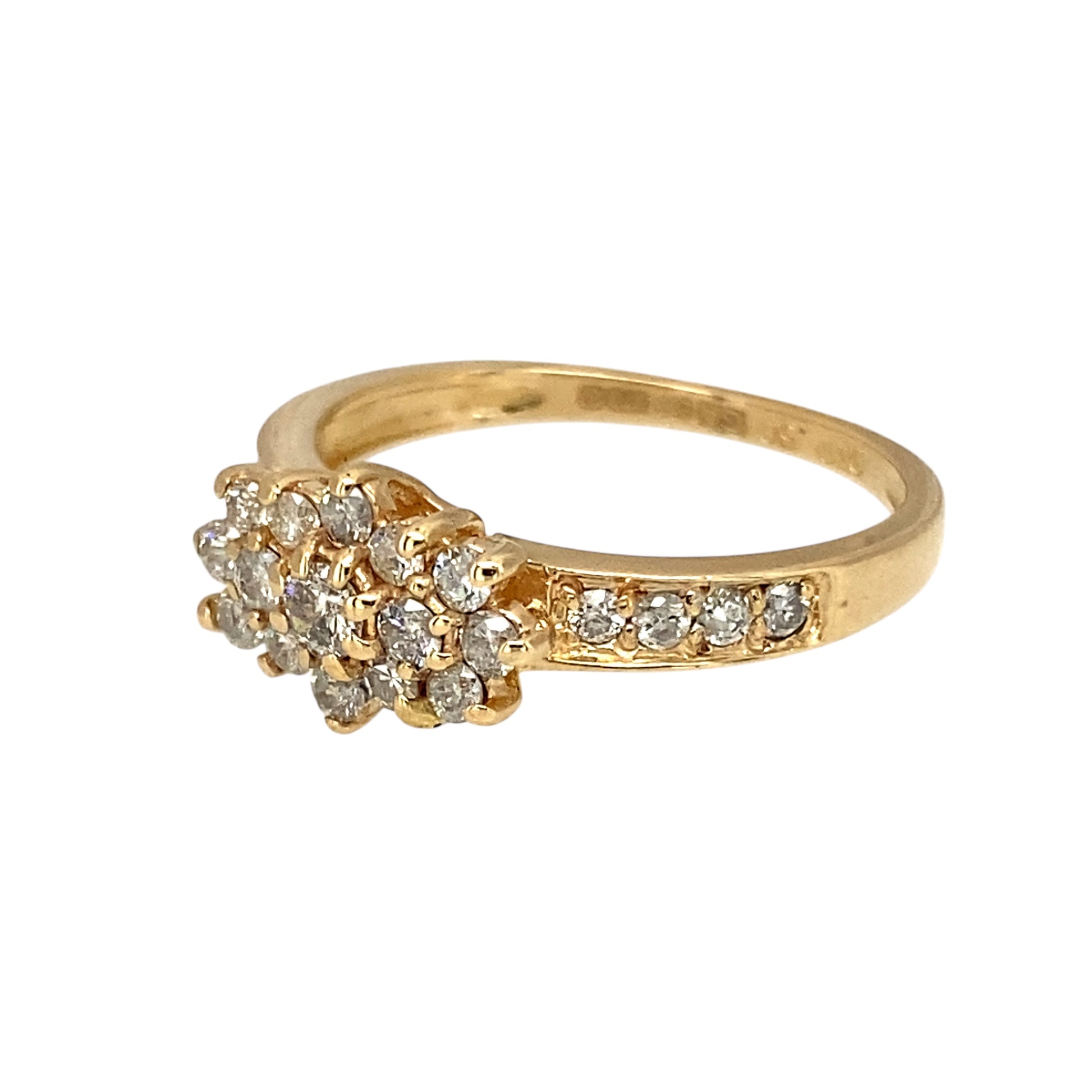 Add a touch of timeless elegance to your jewellery collection with this pre-owned 9ct yellow gold & diamond set cluster ring, featuring:

Design: A classic cluster ring, enhanced by diamond-set shoulders for extra sparkle and sophistication.
Material: 9-carat yellow gold, offering a warm and elegant appeal.
Gemstones: Features approximately 0.50ct of total diamond content, adding brilliance and refinement.
Size & Weight: Designed in size L, with a well-balanced weight of 2 grams for a comfortable fit.
Front
