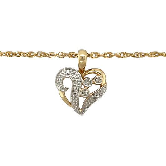 Add a touch of romance and elegance to your jewellery collection with this pre-owned 9ct yellow and white gold & diamond set heart pendant necklace, featuring:

Design: A beautifully crafted heart-shaped pendant, symbolising love and timeless elegance.
Material: Made from 9-carat yellow and white gold, offering a sophisticated contrast and polished finish.
Gemstone Detail: Accented with sparkling diamonds, adding a touch of brilliance and charm.
