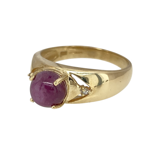 Add a touch of elegance and colour to your jewellery collection with this pre-owned 9ct yellow gold diamond & purple stone set ring, featuring:

Design: A classic and sophisticated setting, showcasing a vibrant central gemstone.
Material: 9-carat yellow gold, offering a warm and polished finish.
Gemstone Arrangement: Features a striking 7mm diameter purple stone, radiating rich colour.
Diamond Accents: Sparkling diamonds enhance the brilliance of the central stone.
