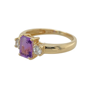 Add a touch of colour and sparkle to your jewellery collection with this pre-owned 9ct yellow gold amethyst and cubic zirconia set trilogy ring, featuring:

Design: A classic trilogy setting with a vibrant centre stone flanked by sparkling accents for a balanced and elegant look.
Material: 9-carat yellow gold, offering a warm and polished finish that enhances the gemstones.
Gemstone Detail: Features a 7mm by 5mm rectangular-cut amethyst at the centre, accented by cubic zirconia stones on either side.