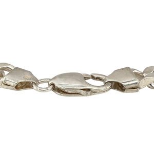 Add a bold and stylish piece to your jewellery collection with this pre-owned 925 silver 8.5" curb bracelet.

Design: Featuring a classic curb chain design, this bracelet offers a sleek and timeless look with wide, polished links.
Material: Made from 925 sterling silver, providing a high-quality and durable finish that enhances its stylish appearance.
Size & Weight: The bracelet measures 8.5" in length with a link width of 8mm and weighs 32.30 grams, offering a comfortable and substantial fit.
