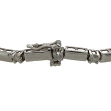 Load image into Gallery viewer, Add a touch of elegance to your jewellery collection with this pre-owned 9ct white gold diamond set bar bracelet.

Design: A sleek bar design featuring diamonds set along the length of the bracelet, offering a refined and contemporary look.
Material: Made from 9-carat white gold, providing a polished and sophisticated finish that highlights the sparkle of the diamonds.
Gemstone Detail: Set with approximately 0.50ct of diamonds, adding a beautiful touch of brilliance to the design.

