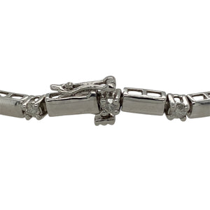 Add a touch of elegance to your jewellery collection with this pre-owned 9ct white gold diamond set bar bracelet.

Design: A sleek bar design featuring diamonds set along the length of the bracelet, offering a refined and contemporary look.
Material: Made from 9-carat white gold, providing a polished and sophisticated finish that highlights the sparkle of the diamonds.
Gemstone Detail: Set with approximately 0.50ct of diamonds, adding a beautiful touch of brilliance to the design.
