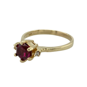 Add a touch of colour and sophistication to your collection with this pre-owned 14ct yellow gold diamond and pink tourmaline set ring, combining bold design with elegant sparkle, featuring:

Design: A striking six-sided dark pink tourmaline takes centre stage, set vertically for a modern and distinctive look, accented by sparkling diamonds for added brilliance.
Material: Made from 14-carat yellow gold, the warm
