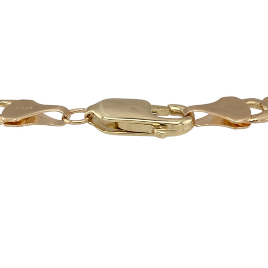 Bring classic strength and style to your collection with this pre-owned 9ct yellow gold 8.25" curb bracelet, offering a timeless design with bold presence—perfect for everyday wear or layered looks.

Design: Featuring traditional flat curb links, the bracelet delivers a sleek, interlocking pattern known for its durability and signature style.
Material: Made from 9-carat yellow gold, the polished finish enhances the warm tone and highlights the smooth, reflective surface of each link.
