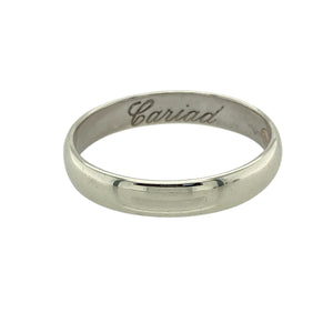 Bring heartfelt sentiment and timeless elegance to your collection with this pre-owned 9ct white gold Clogau Cariad wedding band ring, featuring refined design and a hidden message of love—perfect for meaningful commitments or personal keepsakes.

Design: The 4mm wide band offers a classic polished profile with the word Cariad (Welsh for “beloved”) engraved on the inside, symbolising love and affection.
