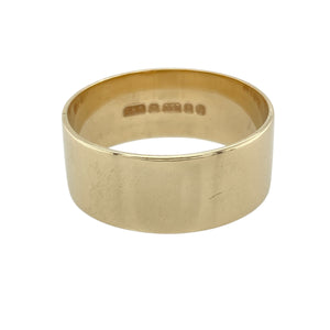 Make a bold and timeless statement with this pre-owned 9ct yellow gold flat wedding band ring—modern in profile and classic in meaning.

Design: This 8mm wide band features a flat-profile design with clean lines and a smooth, polished surface for a sleek and contemporary look.
Material: Made from 9-carat yellow gold, the warm tone and high-shine finish offer a rich, elegant appearance with lasting appeal.
