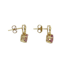 Load image into Gallery viewer, Add a touch of feminine sparkle and graceful colour to your collection with these pre-owned 9ct yellow gold diamond and pink stone set drop earrings—elegant, radiant, and perfect for special occasions or everyday charm.

Design: Each earring features a 6mm round pink stone suspended below a delicate diamond accent, creating a soft, eye-catching drop design with classic appeal.
Material: Made from 9-carat yellow gold, the polished finish beautifully complements the soft pink hue of the stones
