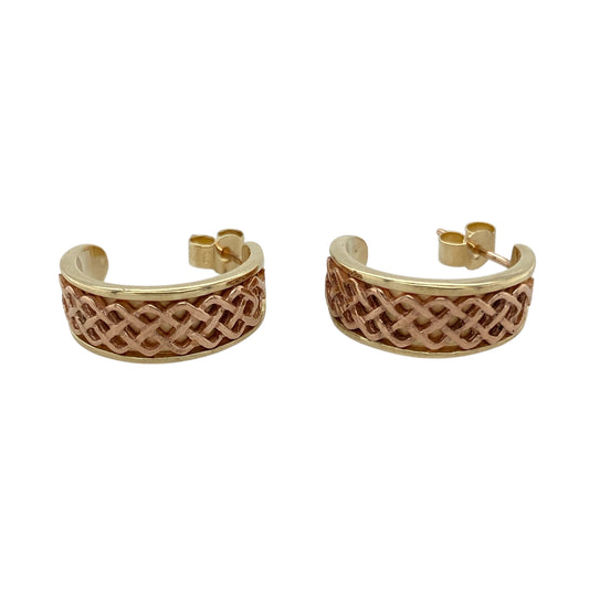 Add romantic elegance and rich heritage to your collection with these pre-owned 9ct yellow and rose gold Clogau Lady Guinevere half hoop earrings—perfect for timeless beauty with a story to tell.

Design: Inspired by the legendary Lady Guinevere, each earring features a graceful half hoop form combining yellow and rose gold in a flowing, feminine design.
Material: Made from 9-carat yellow and rose gold, the polished finish highlights the soft contrast between metals and enhances the elegant detailing.
