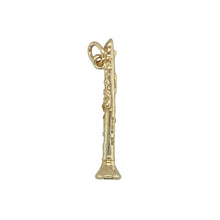 Load image into Gallery viewer, Celebrate musical passion with this pre-owned 9ct yellow gold clarinet charm/pendant—perfect for musicians, collectors, or anyone with a love for melody and detail.

Design: The charm features a miniature clarinet design with realistic detailing, capturing the essence of the instrument in a finely crafted form.
Material: Made from 9-carat yellow gold, the polished finish adds a warm glow that highlights the intricate workmanship.

