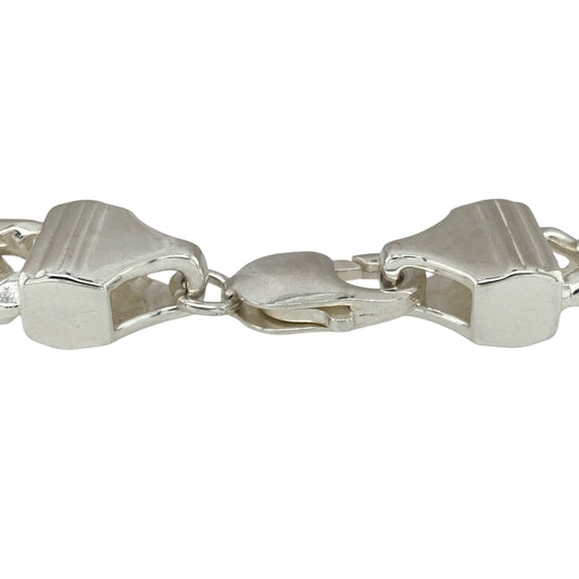 Bring bold style and lightweight comfort to your jewellery collection with this new 925 silver 8.5" hollow curb bracelet—a classic design with impressive presence and everyday wearability.

Design: Featuring a traditional curb link pattern with a wide 11mm link width, this bracelet delivers a striking look while maintaining a lighter feel.
Material: Made from 925 sterling silver, the hollow construction offers the look of a heavier bracelet with improved comfort for daily wear.
