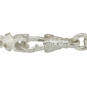 Bring bold geometry and playful design to your jewellery collection with this new 925 silver 7.5" patterned Lego link bracelet—a distinctive piece with modern appeal and unique texture.

Design: Featuring 6mm wide Lego-inspired links with subtle engraved patterning, the bracelet offers a structured, contemporary look with a fun edge.
Material: Made from solid 925 sterling silver, the polished finish enhances the clean lines and detailed texture of each link.
