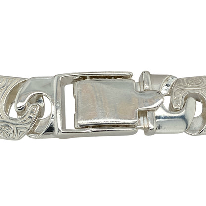 Bring commanding style and intricate craftsmanship to your jewellery collection with this new 925 silver 8" Celtic-style patterned Bali link bracelet—a bold statement piece with deep cultural detail and standout presence.

Design: Featuring 15mm wide Bali-style links adorned with detailed Celtic-inspired patterns, this bracelet blends traditional symbolism with strong, decorative form.
