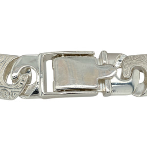 Bring commanding style and intricate craftsmanship to your jewellery collection with this new 925 silver 8" Celtic-style patterned Bali link bracelet—a bold statement piece with deep cultural detail and standout presence.

Design: Featuring 15mm wide Bali-style links adorned with detailed Celtic-inspired patterns, this bracelet blends traditional symbolism with strong, decorative form.
