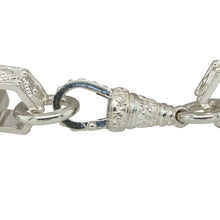 Load image into Gallery viewer, Bring geometric strength and intricate design to your jewellery collection with this new 925 silver 9.5&quot; patterned hexagon link bracelet—a bold and modern piece with sharp lines and detailed texture.

Design: Featuring 15mm wide hexagon-shaped links with fine patterning, this bracelet delivers a striking angular silhouette with a contemporary edge.
Material: Made from solid 925 sterling silver, the polished and engraved finish highlights each facet of the geometric links for a dynamic, high-shine effect.


