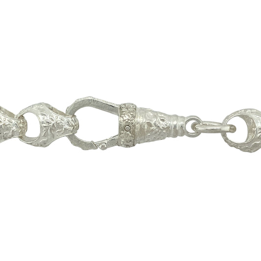Bring distinctive texture and classic design to your jewellery collection with this new 925 silver 25" patterned acorn link chain—a bold and elegant piece inspired by natural form and traditional style.

Design: Featuring 11mm wide acorn-style links with detailed patterning, this chain showcases a unique shape with rich texture and flowing structure.
Material: Made from solid 925 sterling silver, the polished and engraved finishes enhance the depth and craftsmanship of each individual link.
