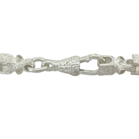 Bring structured style and modern detail to your jewellery collection with this new 925 silver 24" patterned Lego chain—a distinctive piece with geometric form and bold silver shine.

Design: Featuring 7mm wide rectangular links with engraved patterning, this chain offers a contemporary Lego-inspired look with clean lines and subtle texture.
Material: Made from solid 925 sterling silver, the polished and detailed finishes enhance the chain’s dimensional appearance and reflective quality.
