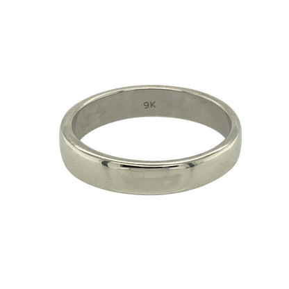 Bring sleek elegance and timeless simplicity to your collection with this pre-owned 9ct white gold wedding band ring—a classic design with a modern finish.

Design: This ring features a 4mm wide band with a smooth, polished surface, offering clean lines and understated style.
Material: Made from 9-carat white gold, the cool tone and reflective finish give the band a contemporary yet timeless look.
Ring Detail: The gently curved profile ensures a comfortable fit, making it ideal for everyday wear.
