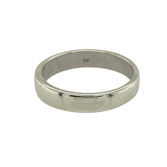 Bring sleek elegance and timeless simplicity to your collection with this pre-owned 9ct white gold wedding band ring—a classic design with a modern finish.

Design: This ring features a 4mm wide band with a smooth, polished surface, offering clean lines and understated style.
Material: Made from 9-carat white gold, the cool tone and reflective finish give the band a contemporary yet timeless look.
Ring Detail: The gently curved profile ensures a comfortable fit, making it ideal for everyday wear.
