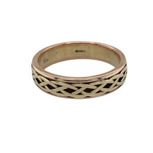 Load image into Gallery viewer, Celebrate heritage and timeless craftsmanship with this pre-owned 9ct yellow and rose gold Clogau Celtic weave band ring—a bold and meaningful design rooted in tradition.

Design: The 6mm wide band features an intricate Celtic weave pattern, blending yellow and rose gold to create a rich, interlaced design symbolising eternity and unity.
Material: Made from 9-carat yellow and rose gold, the polished finish enhances the contrast between tones and showcases the detailed weave.

