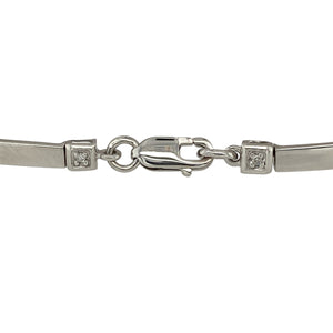 Add sleek sparkle and refined elegance to your collection with this pre-owned 9ct white gold and diamond set bar bracelet—a timeless piece that offers delicate brilliance, perfect for special occasions or adding subtle sophistication to everyday wear.

Design: This 7" bracelet features a slim 3mm wide bar set with shimmering diamonds, creating a graceful, modern focal point along a classic chain.
