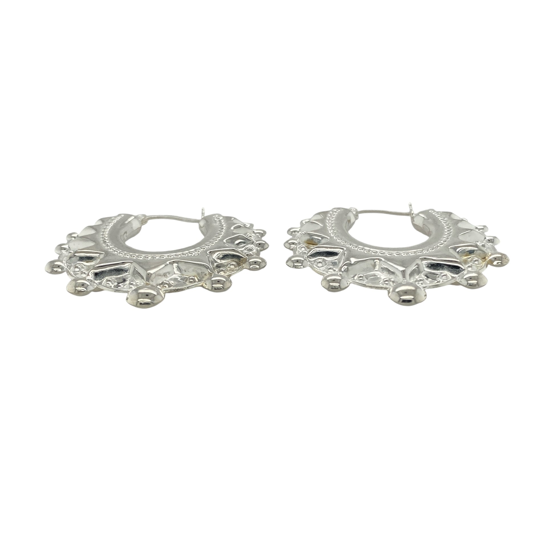 Bring bold sophistication and timeless shine to your collection with these new 925 silver large fancy round creole earrings, offering a striking design and elegant presence—perfect for making a standout statement.

Design: The earrings feature a large round creole style with a fancy, detailed finish, measuring approximately 39mm in diameter. Their graceful curves and intricate design create a stunning, eye-catching silhouette that elevates any look.
