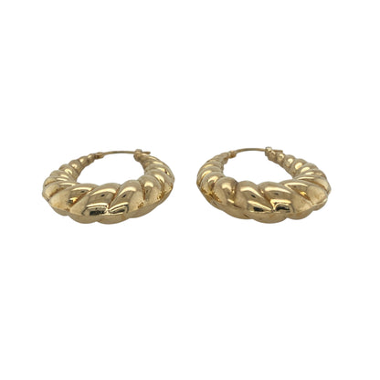 Bring elegant texture and timeless shine to your collection with these pre-owned 9ct yellow gold patterned oval creole earrings, offering a sophisticated blend of classic design and eye-catching detail—perfect for elevating any look.

Design: Each earring features an oval creole shape adorned with an intricate patterned finish, creating a refined and striking focal point that stands out beautifully.
