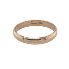 Load image into Gallery viewer, Bring romantic warmth and timeless elegance to your collection with this pre-owned 9ct rose gold wedding band ring, offering soft colour and classic design — perfect for marking life’s most meaningful moments.

Design: This 4mm band features a smooth, balanced profile that offers a refined presence on the hand, ideal for wearing alone or paired with other rings.
Material: Made from 9-carat rose gold, the polished finish enhances its warm blush hue, adding a soft and radiant glow to any look.


