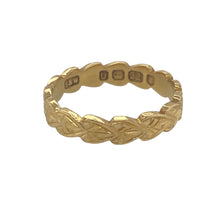 Load image into Gallery viewer, Bring rich colour and romantic detail to your collection with this pre-owned 22ct yellow gold patterned heart style band ring—a meaningful design with timeless warmth and charm.

Design: The ring features an engraved heart motif repeated around the 4mm wide band, offering a romantic and decorative finish with vintage appeal.
Material: Made from 22-carat yellow gold, the deep, rich tone adds a luxurious feel while enhancing the intricacy of the engraved pattern.

