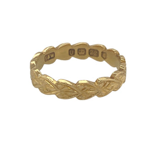 Bring rich colour and romantic detail to your collection with this pre-owned 22ct yellow gold patterned heart style band ring—a meaningful design with timeless warmth and charm.

Design: The ring features an engraved heart motif repeated around the 4mm wide band, offering a romantic and decorative finish with vintage appeal.
Material: Made from 22-carat yellow gold, the deep, rich tone adds a luxurious feel while enhancing the intricacy of the engraved pattern.
