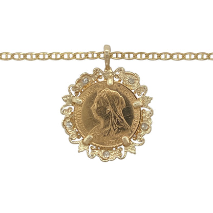 Bring historic charm and refined brilliance to your collection with this pre-owned 9ct yellow gold and diamond set floral surround pendant necklace—featuring a genuine 1900 Old Veil Head Victoria half sovereign coin for a touch of timeless prestige.

Design: The pendant measures 3.3cm in length including the bail and showcases a 22ct gold 1900 Old Veil Head Victoria half sovereign coin (London Mint), securely mounted within a 9ct yellow gold floral-inspired frame accented with sparkling diamonds.
