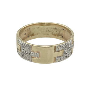 Add bold detail and modern edge to your jewellery collection with this pre-owned 9ct yellow and white gold band ring, featuring a geometric design and subtle diamond accents.

Design: The 7mm wide band showcases a contemporary geometric pattern in contrasting yellow and white gold, accented with small diamonds for a refined sparkle.
Material: Made from 9-carat yellow and white gold, the dual-tone finish creates a striking visual contrast and a sleek, polished look.

