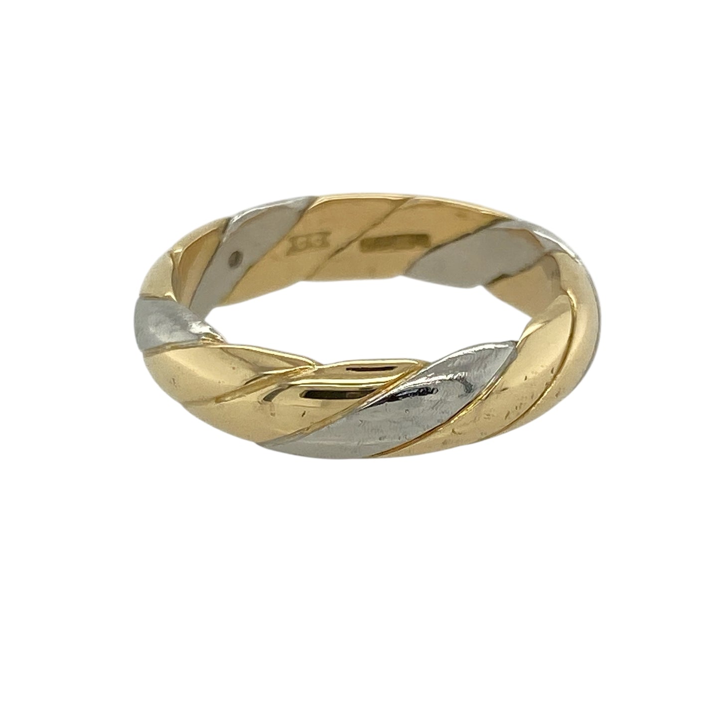 Add a touch of modern elegance to your jewellery collection with this pre-owned 18ct yellow and white gold twist band ring—striking in its simplicity and perfect for everyday sophistication.

Design: The ring features an interwoven twist design combining yellow and white gold, creating a fluid, sculptural look with a contemporary edge.
Material: Made from 18-carat yellow and white gold, the high-polish finish enhances the contrast between the metals for a refined two-tone effect.
