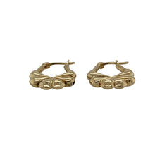 Load image into Gallery viewer, Bring delicate charm and feminine detail to your jewellery collection with these pre-owned 9ct yellow gold fancy flower style creole earrings—perfect for adding a touch of elegance to everyday wear.

Design: Each earring features a creole hoop shape with an intricate flower-inspired pattern, creating subtle texture and visual interest.
Material: Made from 9-carat yellow gold, the polished finish enhances the warm golden tone and highlights the decorative detailing.

