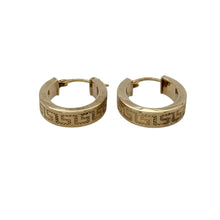 Load image into Gallery viewer, Bring classic design and bold detail to your jewellery collection with these pre-owned 9ct yellow gold Greek key oval creole earrings—perfect for adding a touch of timeless style to any look.

Design: Each earring features an oval creole shape with a detailed Greek key pattern, creating a distinctive and sophisticated appearance.
Material: Made from 9-carat yellow gold, the polished finish enhances the warm golden tone and highlights the intricate pattern.

