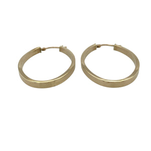 Bring simple elegance and timeless style to your jewellery collection with these pre-owned 9ct yellow gold plain oval creole earrings—perfect for effortless everyday wear.

Design: Each earring features a smooth oval creole shape with a polished surface for a sleek and classic look.
Material: Made from 9-carat yellow gold, the polished finish enhances the warm golden tone.
Earring Detail: The hinged fastening ensures secure and comfortable wear, making them ideal for daily use.
