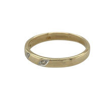 Load image into Gallery viewer, Bring classic elegance and a hint of sparkle to your collection with this pre-owned 9ct yellow gold diamond band ring—perfect for everyday wear, stacking, or marking a special occasion with timeless style.

Design: The ring features a slim 2mm band adorned with three small diamonds, offering a refined and understated sparkle.
Material: Made from 9-carat yellow gold, the polished finish complements the brilliance of the diamonds while adding warmth and sophistication.

