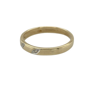Bring classic elegance and a hint of sparkle to your collection with this pre-owned 9ct yellow gold diamond band ring—perfect for everyday wear, stacking, or marking a special occasion with timeless style.

Design: The ring features a slim 2mm band adorned with three small diamonds, offering a refined and understated sparkle.
Material: Made from 9-carat yellow gold, the polished finish complements the brilliance of the diamonds while adding warmth and sophistication.
