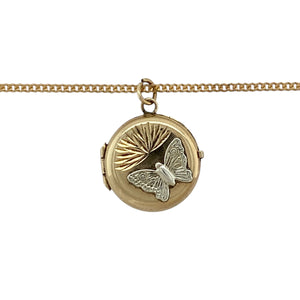 Bring delicate charm and two-tone elegance to your collection with this pre-owned 9ct yellow and white gold round butterfly locket on an 18" curb chain—perfect for carrying treasured memories in style.

Design: The necklace features a 2cm long round locket, including the bail, adorned with a detailed butterfly motif in contrasting yellow and white gold.
Material: Made from 9-carat yellow and white gold, the polished finish enhances the warm and bright tones while highlighting the intricate design.
