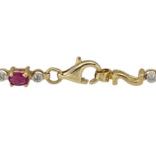 Load image into Gallery viewer, Bring rich colour and refined sparkle to your collection with this pre-owned 10ct yellow gold diamond and ruby bracelet—perfect for adding elegance to both everyday wear and special occasions.

Design: The 7.5&quot; bracelet features oval rubies, each measuring 4mm by 3mm, accented by diamonds for a touch of brilliance.
Material: Made from 10-carat yellow gold, the polished finish enhances the deep red of the rubies and the sparkle of the diamonds.

