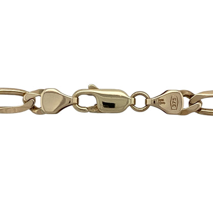 Bring bold character and golden style to your collection with this pre-owned 9ct yellow gold Figaro chain—a classic design with distinctive patterning, perfect for everyday wear or statement styling.

Design: The 18" chain features the iconic Figaro link pattern, alternating short and long links, with a 5mm width for strong visual appeal.
Material: Made from 9-carat yellow gold, the polished finish enhances the stylish link formation and adds timeless elegance.
