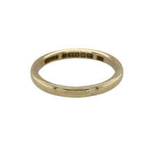 Load image into Gallery viewer, Bring understated elegance and timeless simplicity to your collection with this pre-owned 9ct yellow gold wedding band ring, offering classic style—perfect as a wedding ring, commitment band, or everyday piece of fine jewellery.

Design: The ring features a smooth and polished 2mm wide band with a traditional rounded profile for a refined and minimal look.
Material: Made from 9-carat yellow gold, the polished finish enhances the warm golden tone with a lasting shine.

