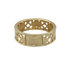 Load image into Gallery viewer, Bring symbolic design and timeless tradition to your collection with this pre-owned 9ct yellow gold Celtic heart band ring, blending heritage style with elegant detail—perfect for meaningful everyday wear or special occasions.

Design: The ring features an intricate Celtic heart motif that flows around the 6mm wide band, creating depth, texture, and symbolism.
Material: Made from 9-carat yellow gold, the polished finish enhances the ornate detailing with a warm golden shine.

