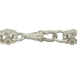 Stand out with this new 925 solid silver star and bar chain, a bold patterned design with substantial weight—perfect for statement wear and standout style.

Design: The chain features alternating star and bar patterned links, each measuring 12mm in width, creating a distinctive and eye-catching look.
Material: Made from solid 925 sterling silver, the polished finish ensures durability while enhancing the intricate detail.