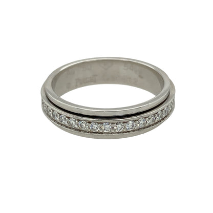 Add sparkle with a twist to your collection with this pre-owned 18ct white gold diamond spinning band ring, a unique design with elegance and movement.

Design: The ring features a 5mm wide spinning band, fully set with diamonds all around for continuous brilliance.
Material: Made in 18-carat white gold, the polished finish provides a sleek backdrop that enhances the diamonds’ radiance.
Ring Detail: With approximately 0.54ct of total diamond content, this ring offers eye-catching sparkle from every angle.