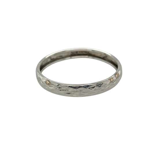 Bring subtle detail and refined style to your collection with this pre-owned 9ct white gold patterned band ring, a delicate design perfect for everyday wear or stacking.

Design: The ring features a 3mm wide band with a patterned finish, adding texture and character to a classic profile.
Material: Made from 9-carat white gold, the polished surface provides a sleek and modern appearance.